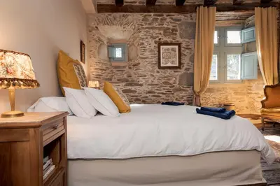Un ou plusieurs lits dans un hébergement de l'établissement Lou Castel Chambres d'Hôtes