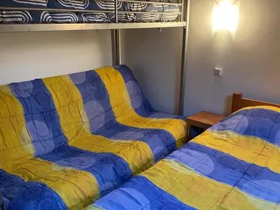 Un ou plusieurs lits dans un hébergement de l'établissement Appartement calme avec vue proche station - FR-1-814-92