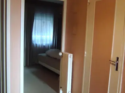 Un ou plusieurs lits dans un hébergement de l'établissement Appartement 5 pers à Super Besse avec Wi-Fi - FR-1-814-94