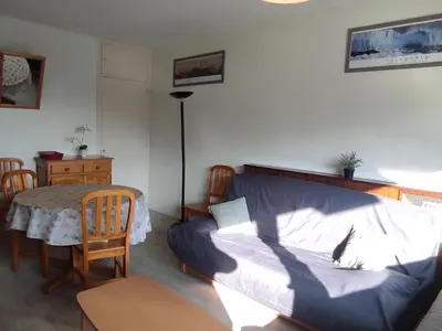 Coin salon dans l'établissement Appartement 5 pers au pied des pistes avec Wi-Fi à Super Besse - FR-1-814-93