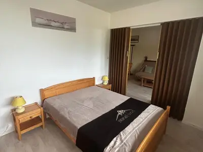 Un ou plusieurs lits dans un hébergement de l'établissement Appartement 5 pers au pied des pistes avec Wi-Fi à Super Besse - FR-1-814-93