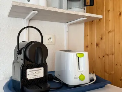 Cuisine ou kitchenette dans l'établissement Appartement 3 Chambres au Cœur de Super Besse, Parking Privé - FR-1-814-99