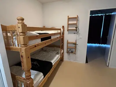 Un ou plusieurs lits dans un hébergement de l'établissement Appartement 6 pers proche pistes et commerces - FR-1-814-95