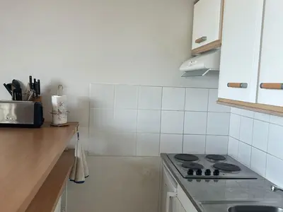 Cuisine ou kitchenette dans l'établissement Appartement 6 pers proche pistes et commerces - FR-1-814-95