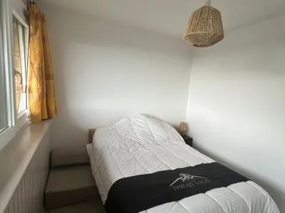 Un ou plusieurs lits dans un hébergement de l'établissement Appartement spacieux 4 pers au pied des pistes - FR-1-814-120