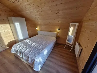Un ou plusieurs lits dans un hébergement de l'établissement Chalet moderne pour 14 pers avec parking privé - FR-1-814-121