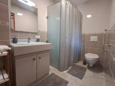 Salle de bains dans l'établissement gîte Le Pressoir