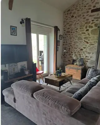 Coin salon dans l'établissement Chambre chez l'habitant 