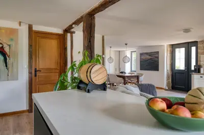 Télévision ou salle de divertissement dans l'établissement Chambres d'hôtes Le tour du Lot