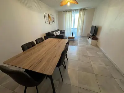 Coin salon dans l'établissement Appartement Sully