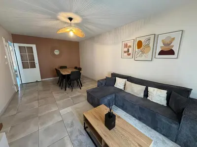 Coin salon dans l'établissement Appartement Sully