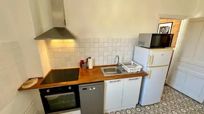 Cuisine ou kitchenette dans l'établissement Le Pan de la Grange, Le Mont-Dore 5pers