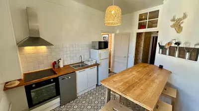 Cuisine ou kitchenette dans l'établissement Le Pan de la Grange, Le Mont-Dore 5pers