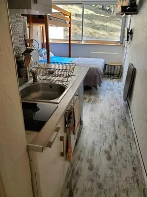 Cuisine ou kitchenette dans l'établissement Studio à Super Besse