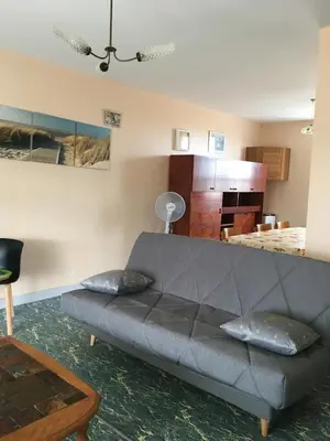 Coin salon dans l'établissement Location saisonnière