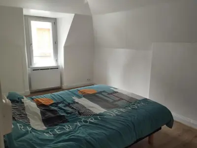Un ou plusieurs lits dans un hébergement de l'établissement Appartement Vic-sur-Cère
