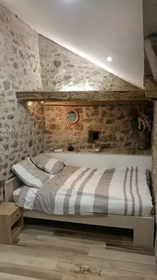 Un ou plusieurs lits dans un hébergement de l'établissement Chambre d'hôte