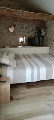 Un ou plusieurs lits dans un hébergement de l'établissement Chambre d'hôte