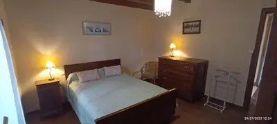 Un ou plusieurs lits dans un hébergement de l'établissement Gite rural aux portes de l'Auvergne