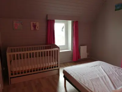 Un ou plusieurs lits dans un hébergement de l'établissement Charmante petite maison proche de Meymac