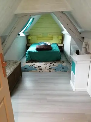Un ou plusieurs lits dans un hébergement de l'établissement Charmante petite maison proche de Meymac