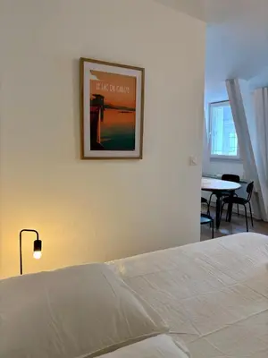 Un ou plusieurs lits dans un hébergement de l'établissement Casa Bondy - Studio - Coeur de ville de Brive