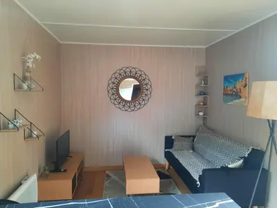 Télévision ou salle de divertissement dans l'établissement Green cube
