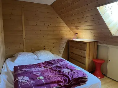 Un ou plusieurs lits dans un hébergement de l'établissement Appartement duplex 6/8 pers, centre station, Le Lioran - FR-1-787-124