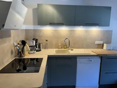 Cuisine ou kitchenette dans l'établissement Appartement duplex 6/8 pers, centre station, Le Lioran - FR-1-787-124
