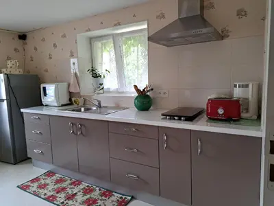 Cuisine ou kitchenette dans l'établissement Au doux refuge