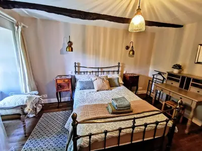 Un ou plusieurs lits dans un hébergement de l'établissement Maison Rocher