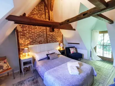 Un ou plusieurs lits dans un hébergement de l'établissement Maison Rocher