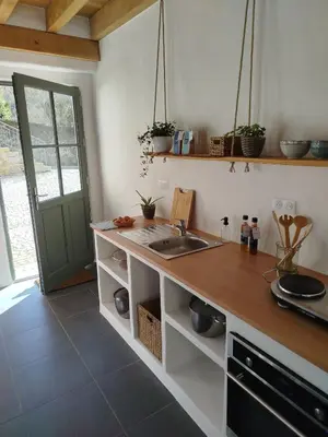 Cuisine ou kitchenette dans l'établissement Terre de Plaisirs