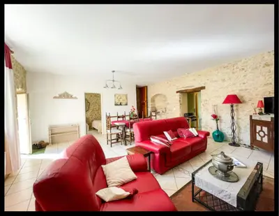 Coin salon dans l'établissement Gîte le Cantou, Martel avec piscine & jacuzzi
