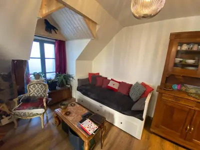 Coin salon dans l'établissement Coco Bonnevie