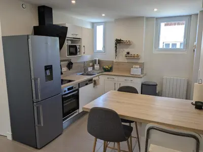 Cuisine ou kitchenette dans l'établissement Appartement 2 chambres L'Oréade Sancy