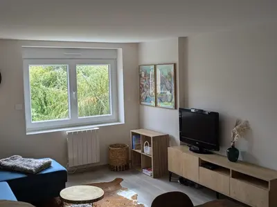 Télévision ou salle de divertissement dans l'établissement Appartement 2 chambres L'Oréade Sancy