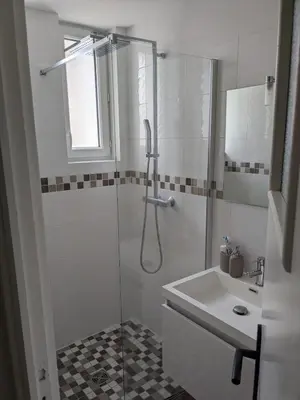 Salle de bains dans l'établissement Appartement 2 chambres L'Oréade Sancy