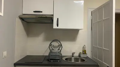 Cuisine ou kitchenette dans l'établissement Appartement cosy wifi à deux pas des Thermes