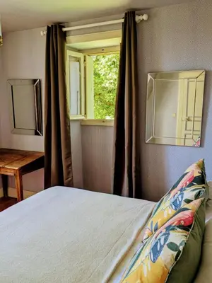 Un ou plusieurs lits dans un hébergement de l'établissement Chateau du Perrier