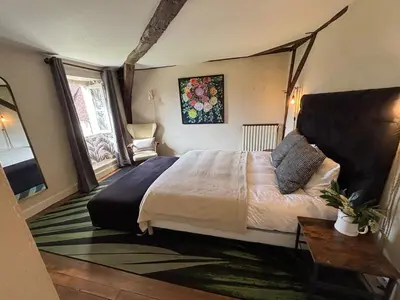 Un ou plusieurs lits dans un hébergement de l'établissement Chateau du Perrier