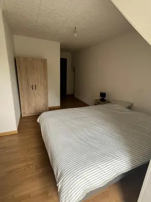 Un ou plusieurs lits dans un hébergement de l'établissement Appartement Mauriac