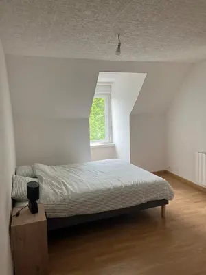 Un ou plusieurs lits dans un hébergement de l'établissement Appartement Mauriac