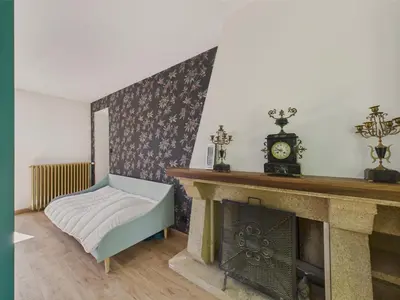 Un ou plusieurs lits dans un hébergement de l'établissement Grand jardin et terrasse - maison pour 7