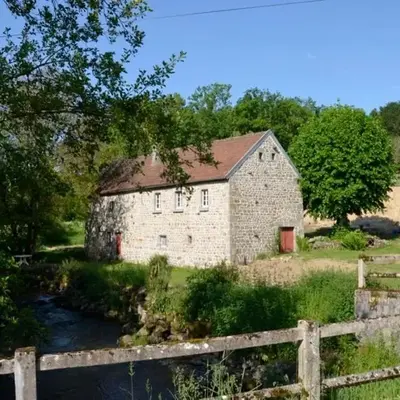 Renovated water mill next to the river Tardes