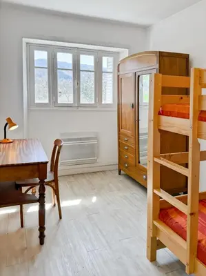 Un ou plusieurs lits dans un hébergement de l'établissement La maison Hortensias Vic-Sur-Cère - 6pers