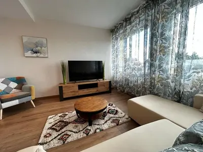 Télévision ou salle de divertissement dans l'établissement La Suite Vienne, chic et calme