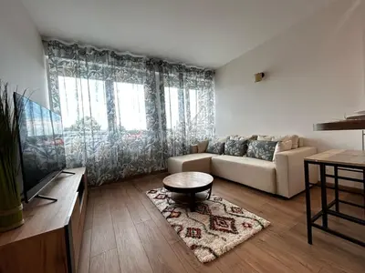 Télévision ou salle de divertissement dans l'établissement La Suite Vienne, chic et calme