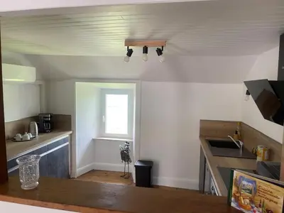 Cuisine ou kitchenette dans l'établissement Chez Julie
