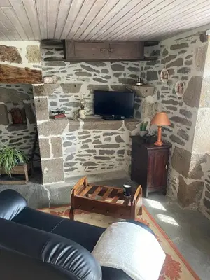 Télévision ou salle de divertissement dans l'établissement Chez Julie